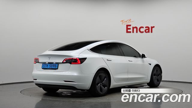 Tesla Model 3 Standard Range Plue RWD - фото 1