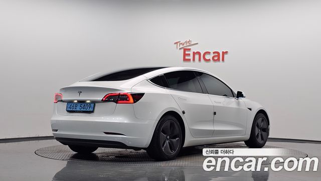 Tesla Model 3 Standard Range Plue RWD - фото 0