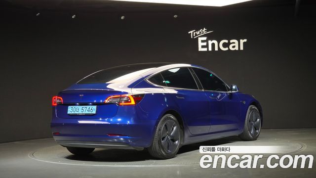 Tesla Model 3 Standard Range Plue RWD - фото 1