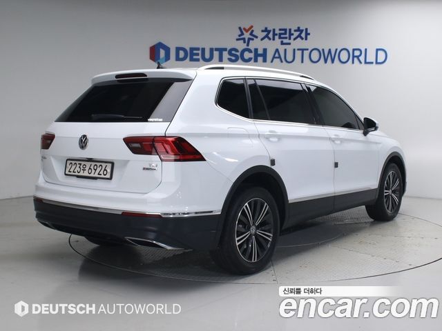 Volkswagen Tiguan 2-го поколения 2.0 TSI 4Motion - фото 1